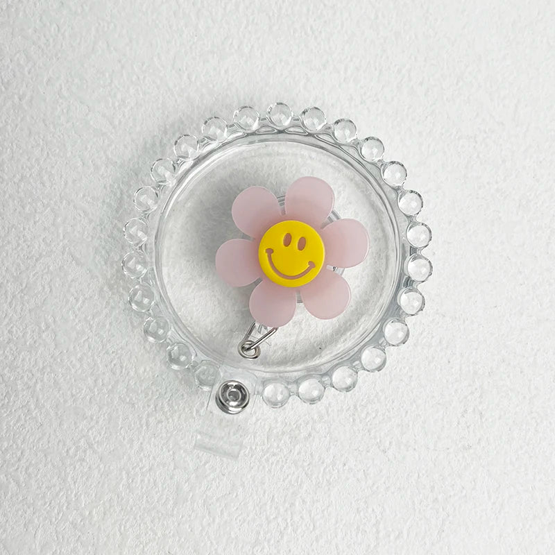 “Smiley Flower Luminous Badge Reel – Retractable ID Holder for Nurses, Students, Kids”