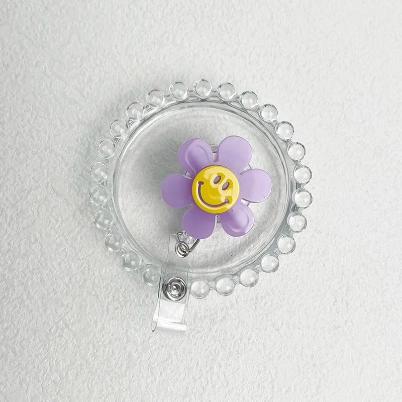 “Smiley Flower Luminous Badge Reel – Retractable ID Holder for Nurses, Students, Kids”