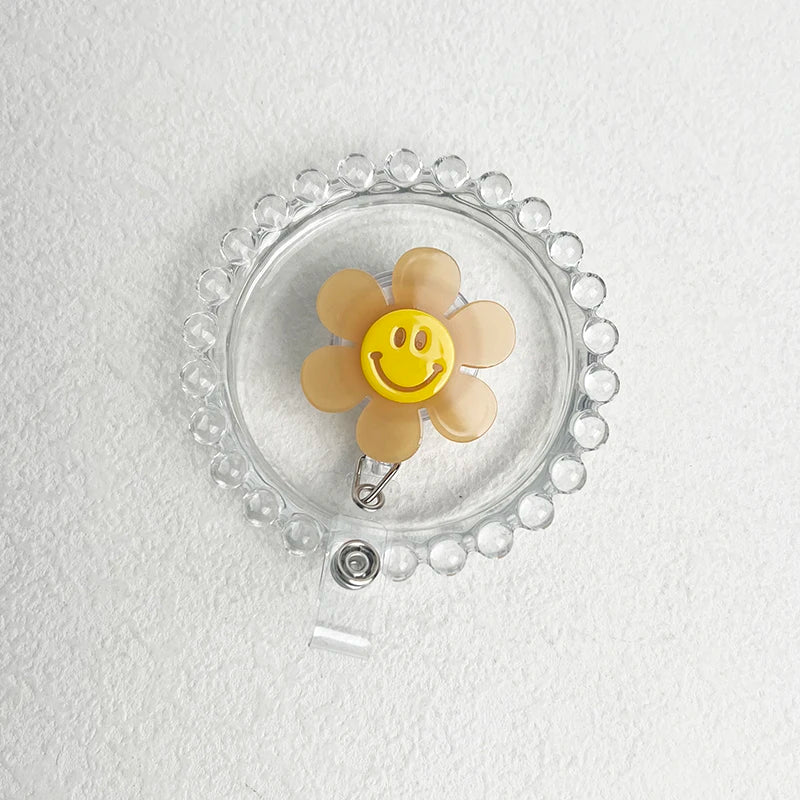 “Smiley Flower Luminous Badge Reel – Retractable ID Holder for Nurses, Students, Kids”