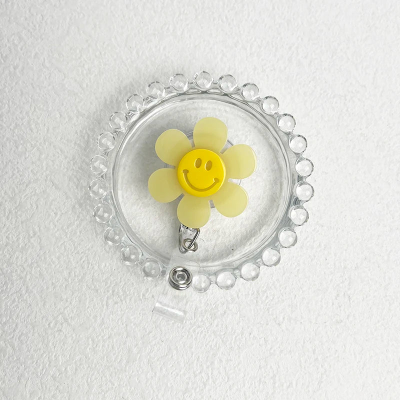 “Smiley Flower Luminous Badge Reel – Retractable ID Holder for Nurses, Students, Kids”