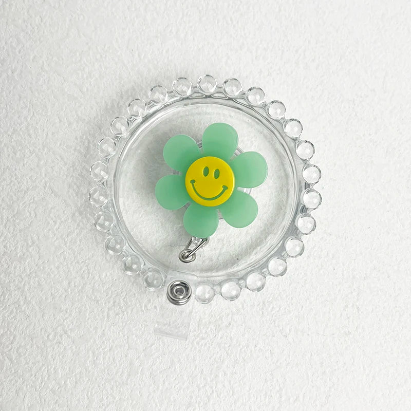 “Smiley Flower Luminous Badge Reel – Retractable ID Holder for Nurses, Students, Kids”