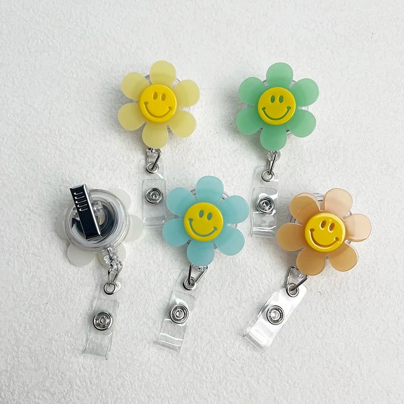 “Smiley Flower Luminous Badge Reel – Retractable ID Holder for Nurses, Students, Kids”