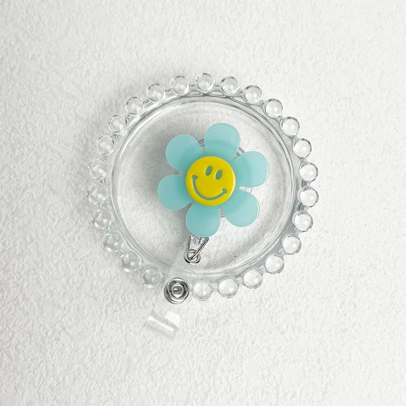 “Smiley Flower Luminous Badge Reel – Retractable ID Holder for Nurses, Students, Kids”
