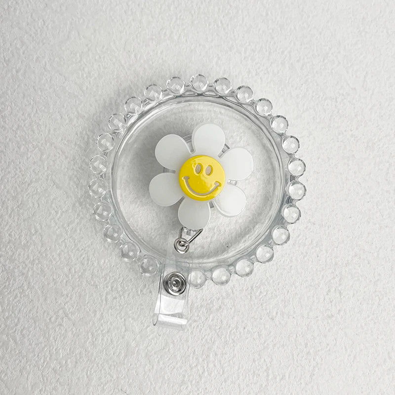 “Smiley Flower Luminous Badge Reel – Retractable ID Holder for Nurses, Students, Kids”